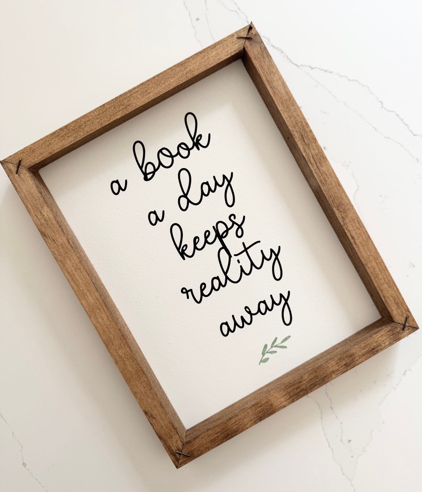 A Book a Day Keeps Reality Away